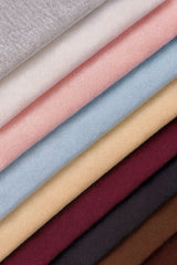 Collection de tissus molleton Cremalier en plusieurs couleurs — gris chiné, blanc, rose, bleu ciel, beige, bordeaux, noir et marron — texture douce et premium.
